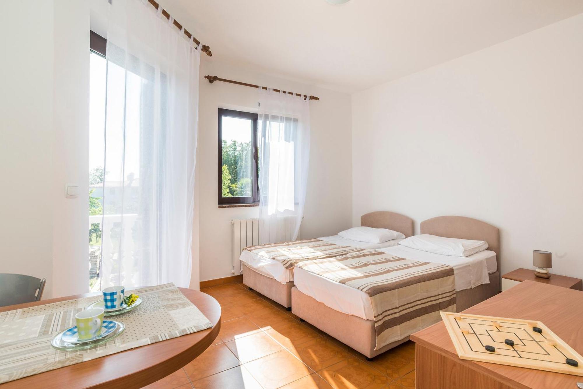 Apartments Vienna Замбратия Стая снимка
